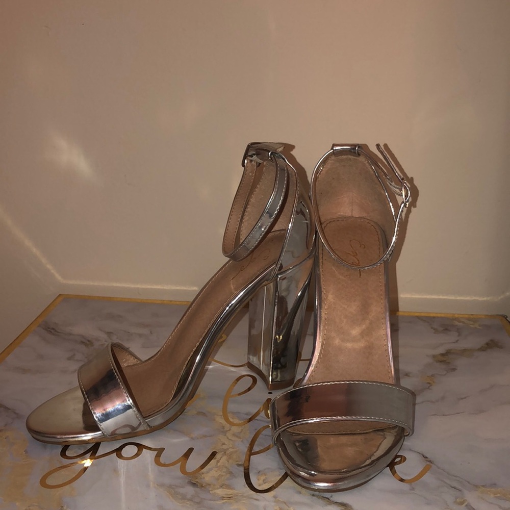 Silver EGO heels size 6.5 for $10. Free hair tie